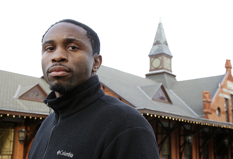 
              In this Thursday, Dec. 8, 2016 photo Charm Howie, of Providence, R.I., stands for a photograph, in Woonsocket, R.I. Howie is one of several residents alleging racially biased and overly aggressive policing by what critics have come to call the "third shift terror squad" of Providence officers who patrol the city's South Side at night. Howie, a black former police cadet, has a unique relationship with the white officers who arrested him after a traffic stop last year: he was their former classmate at an academy he said he was bullied into leaving. (AP Photo/Steven Senne)
            