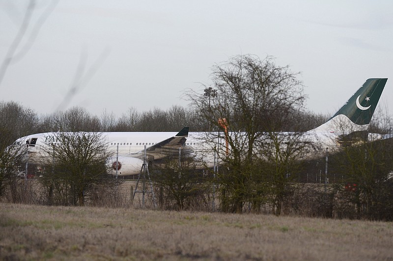 
              An Airbus A330 of Pakistan International Airlines on the tarmac at Stansted Airport, Tuesday Feb. 7, 2017, which was intercepted by RAF Typhoon jets after reports of a disruptive passenger onboard. The flight, PK757, was scheduled to land at London's Heathrow Airport on it's flight from Lahore, Pakistan. (John Stillwell/PA via AP)(/PA via AP)
            