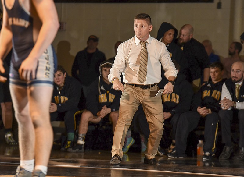 Ben Smith will try to coach Bradley Central's wrestling team to the Region 4-AAA traditional tournament title Saturday at East Hamilton. The Bears won the Class AAA state duals championship last weekend.
