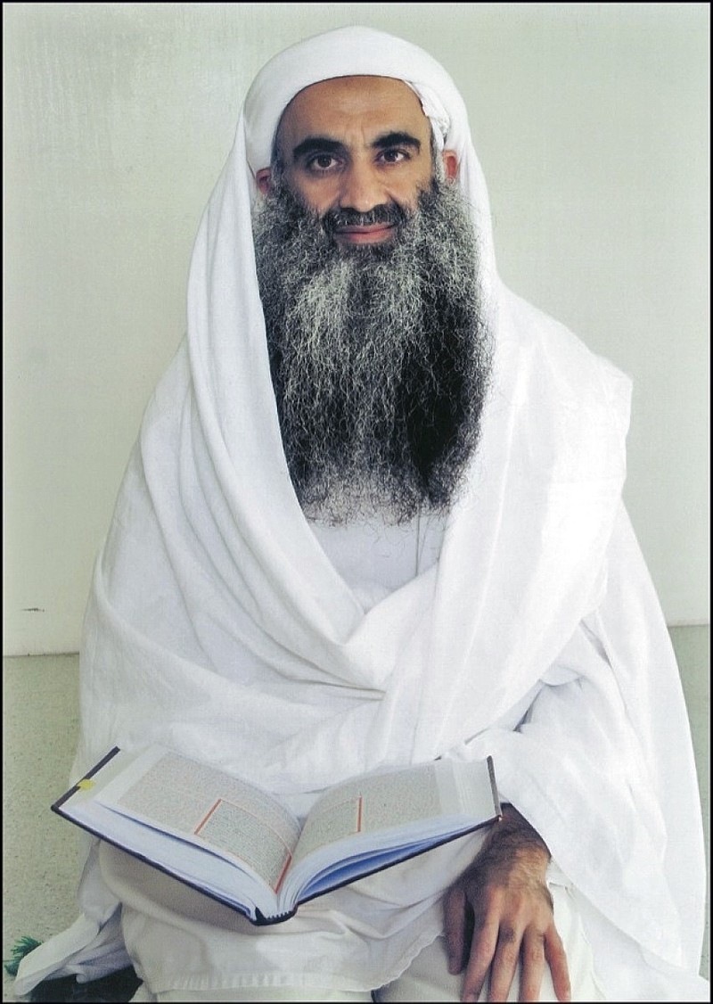 
              In this undated photo taken by the International Red Cross and released by lawyer Marine Corps. Maj. Derek Poteet, his client Khalid Shaikh Mohammad poses for a photo at the U.S. Guantanamo Bay detention center on the military base in Cuba. Mohammad, the man who says he masterminded the Sept. 11 terrorist attack, condemned Barack Obama and the U.S. in a letter sent from the Guantanamo prison and released on Wednesday, Feb. 8, 2017. (Marine Corps. Maj. Derek Poteet via AP)
            