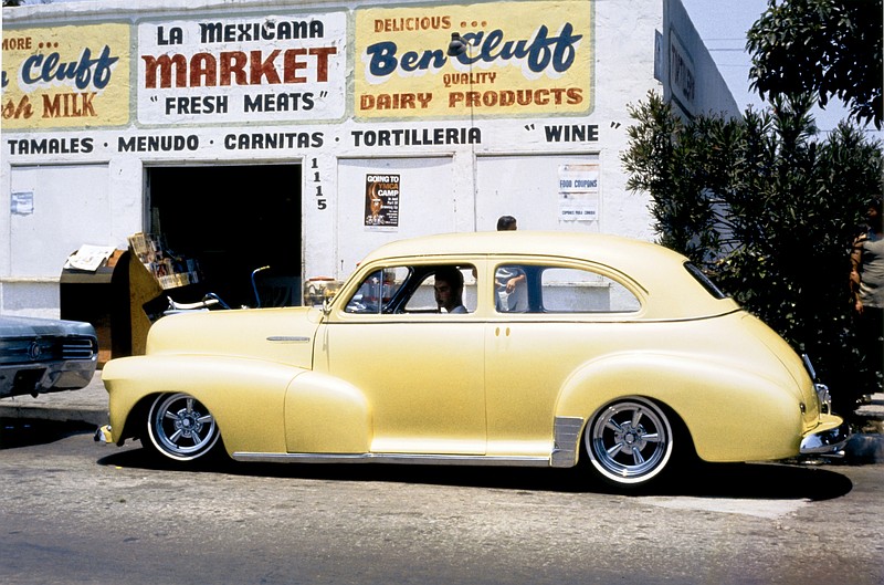 "Chevy in Wilmington, California," is a photo taken in 1972 by Oscar R. Castillo and printed with an inkjet printer in 2012.