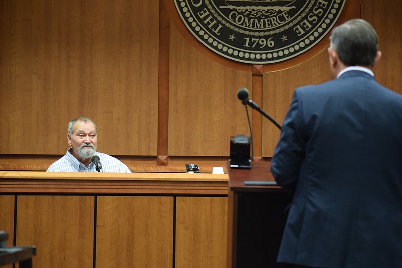 Willard C. "Bill" Land takes the stand in his own defense during his murder trial Feb. 9, 2017, in Sequatchie County, Tenn., Criminal Court under direct questioning by his legal counsel, Public Defender Jeff Harmon.