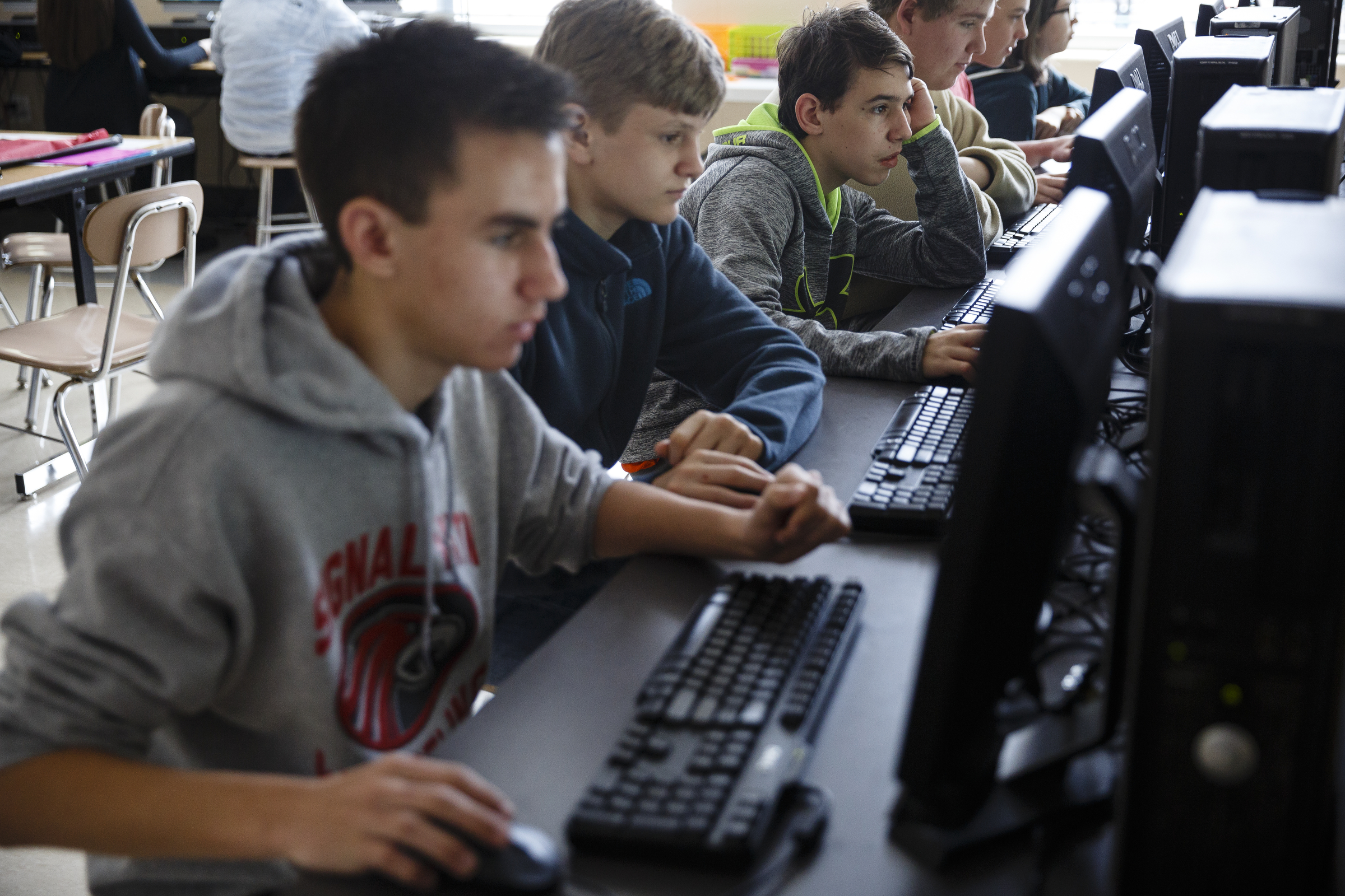 Kaleb McCallum, Kevin Muschel, and Connor Wilson, from left, use the Learning Blade program with classmates in their science class at Signal Mountain Middle High School on Thursday, Feb. 9, 2017, in Chattanooga, Tenn. Learning Blade is an online learning program geared towards STEM education for students.