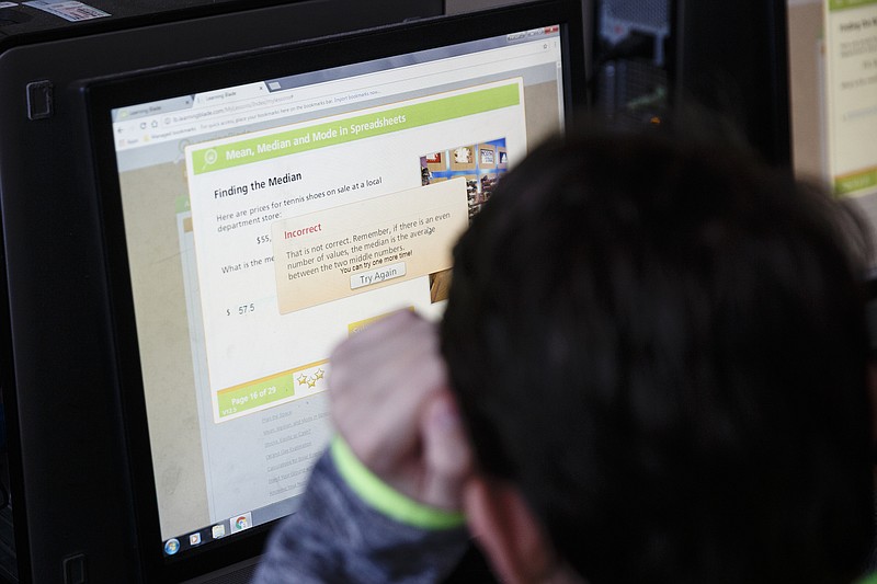 Connor Wilson uses the Learning Blade program with classmates in their science class at Signal Mountain Middle High School on Thursday, Feb. 9, 2017, in Chattanooga, Tenn. Learning Blade is an online learning program geared towards STEM education for students.