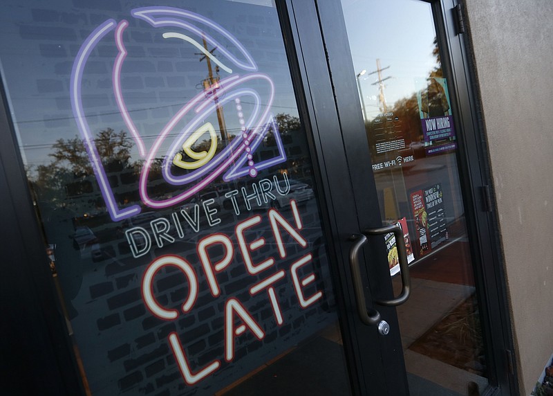 
              This Thursday, Dec. 15, 2016, photo shows a Taco Bell in Metairie, La. Yum Brands, Inc. reports financial earnings Thursday, Feb. 9, 2017. (AP Photo/Gerald Herbert)
            