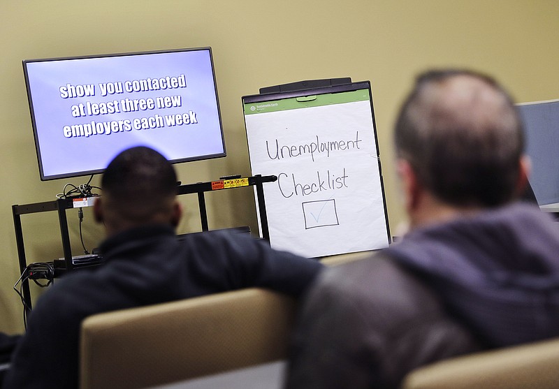 
              FILE - In this Thursday, March 3, 2016, file photo, people attend an employment orientation class at the Georgia Department of Labor office in Atlanta. On Thursday, Feb. 9, 2017, the Labor Department reports on the number of people who applied for unemployment benefits in the previous week. (AP Photo/David Goldman, File)
            