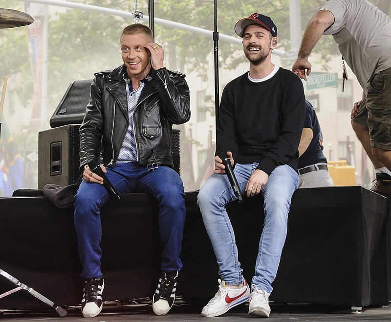 
              FILE - This June 23, 2016 file photo shows Ben Haggerty, left, and Ryan Lewis, of Macklemore & Ryan Lewis, on NBC's "Today" show in New York.  The mainstream rap duo that swept the rap Grammys in 2014 and received backlash after besting Kendrick Lamar, didn’t submit their latest album for contention at the 2017 Grammy Awards. (Photo by Christopher Smith/Invision/AP, File)
            