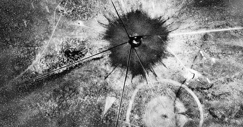FILE - This July 16, 1945 file photo shows an aerial view after the first atomic explosion at Trinity Test Site, N.M. A report is scheduled to be released Friday, Feb. 10, 2017, on the health effects of the people who lived near the site of the world's first atomic bomb test. The Tularosa Basin Downwinders Consortium will release the health assessment report, on residents of a historic Hispanic village of Tularosa near the Trinity Test in the New Mexico desert. (AP Photo, File)

