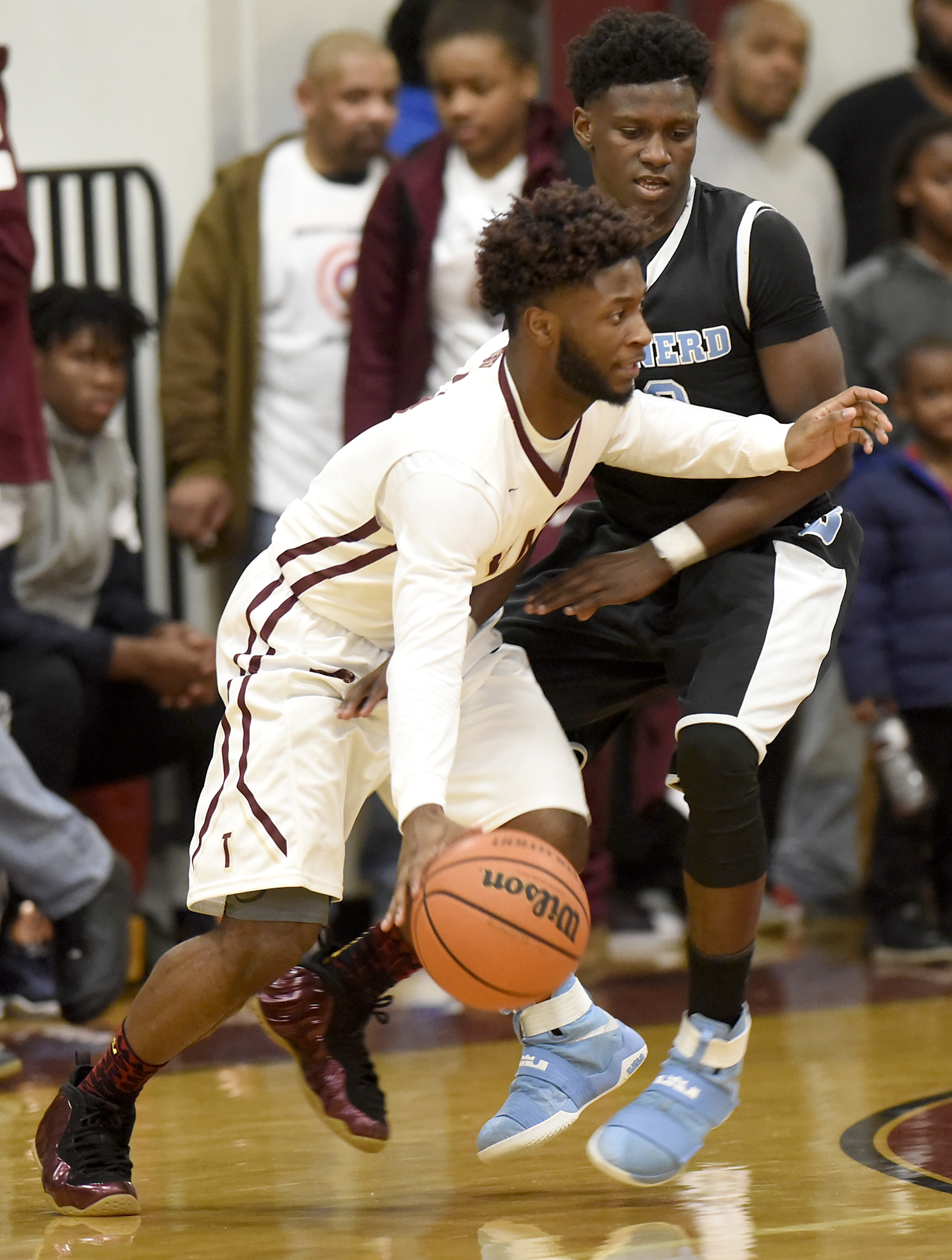 Tyner's Kevin Cameron (3) dribbles past the defense of Brainerd's Joseph Norwood (20). The Brainerd Panthers visited the Tyner Rams in TSSAA basketball action on February 10, 2017.