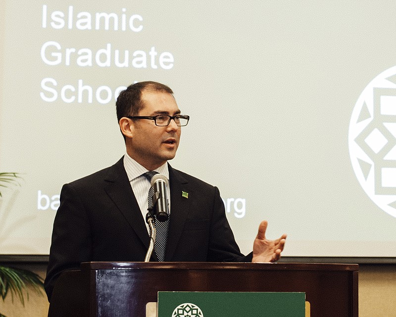 
              This May 16, 2015 handout photo provided by Bayan Claremont shows Bayan Claremont's founding president Jihad Turk speaking to their graduation banquet in Claremont, Calif.  Bayan Claremont is rejecting $800,000 in federal funds aimed at combating violent extremism less than a month into Donald Trump's presidency.  (Bayan Claremont via AP)
            