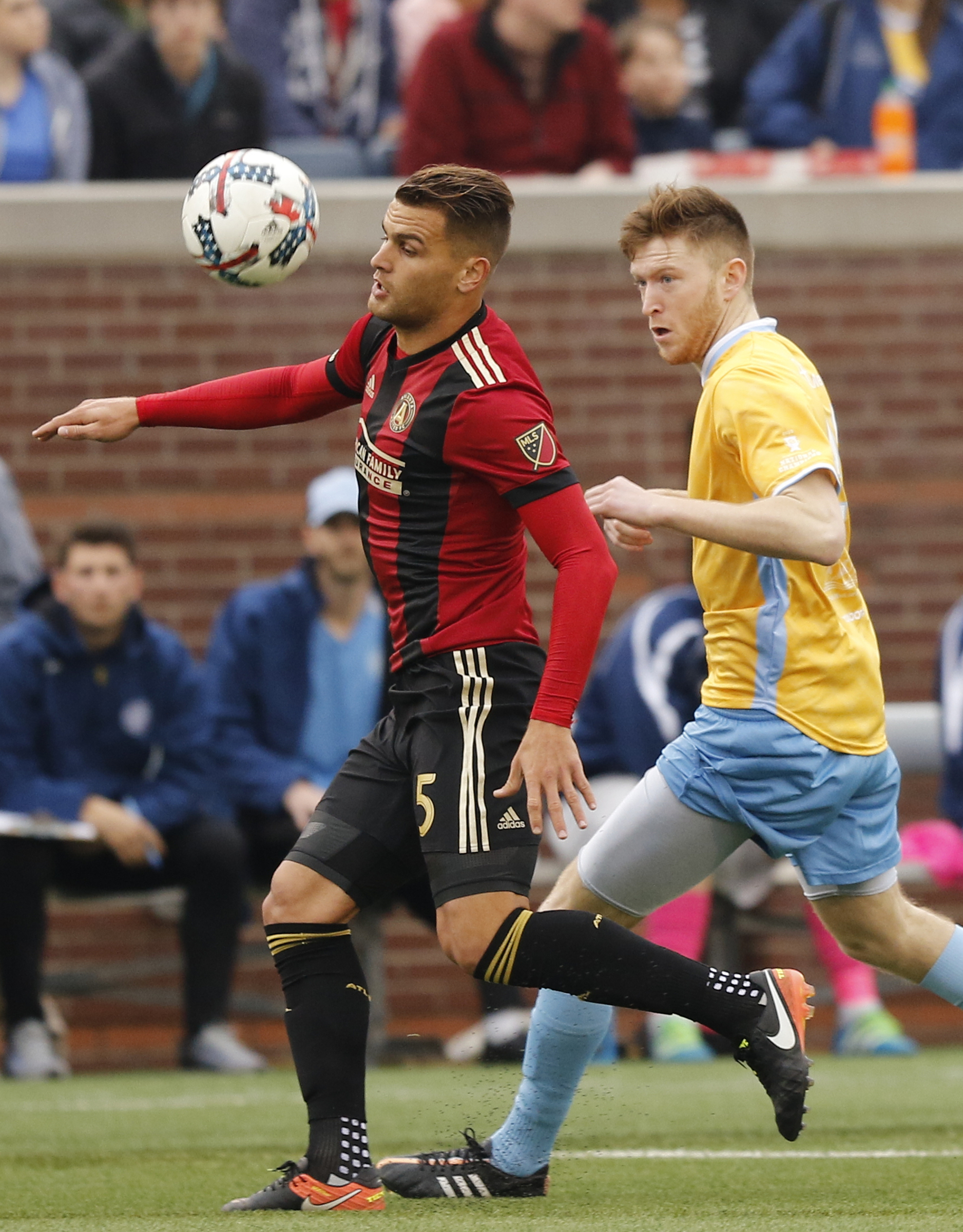 AUFC's Leandro Gonzales Pirez, left, stops the ball ahead of CFC's Danny Whitehall during Chattanooga FC's friendly match against Atlanta United FC at Finely Stadium on Saturday, Feb. 11, 2017, in Chattanooga, Tenn.