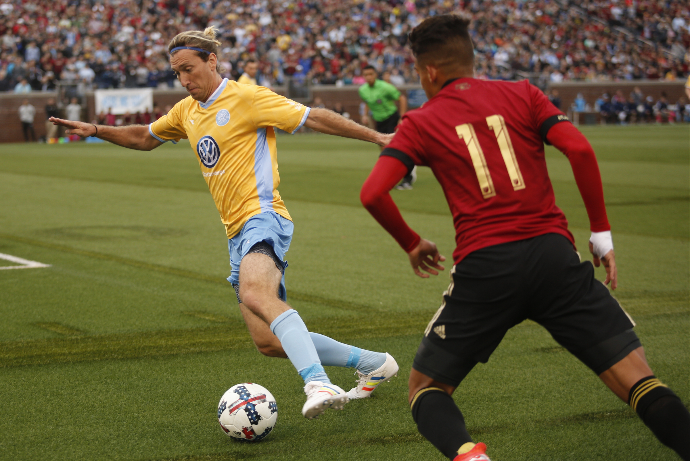 CFC's Juan Hernandez takes a shot around AUFC's Yamil Asad during Chattanooga FC's friendly match against Atlanta United FC at Finely Stadium on Saturday, Feb. 11, 2017, in Chattanooga, Tenn.