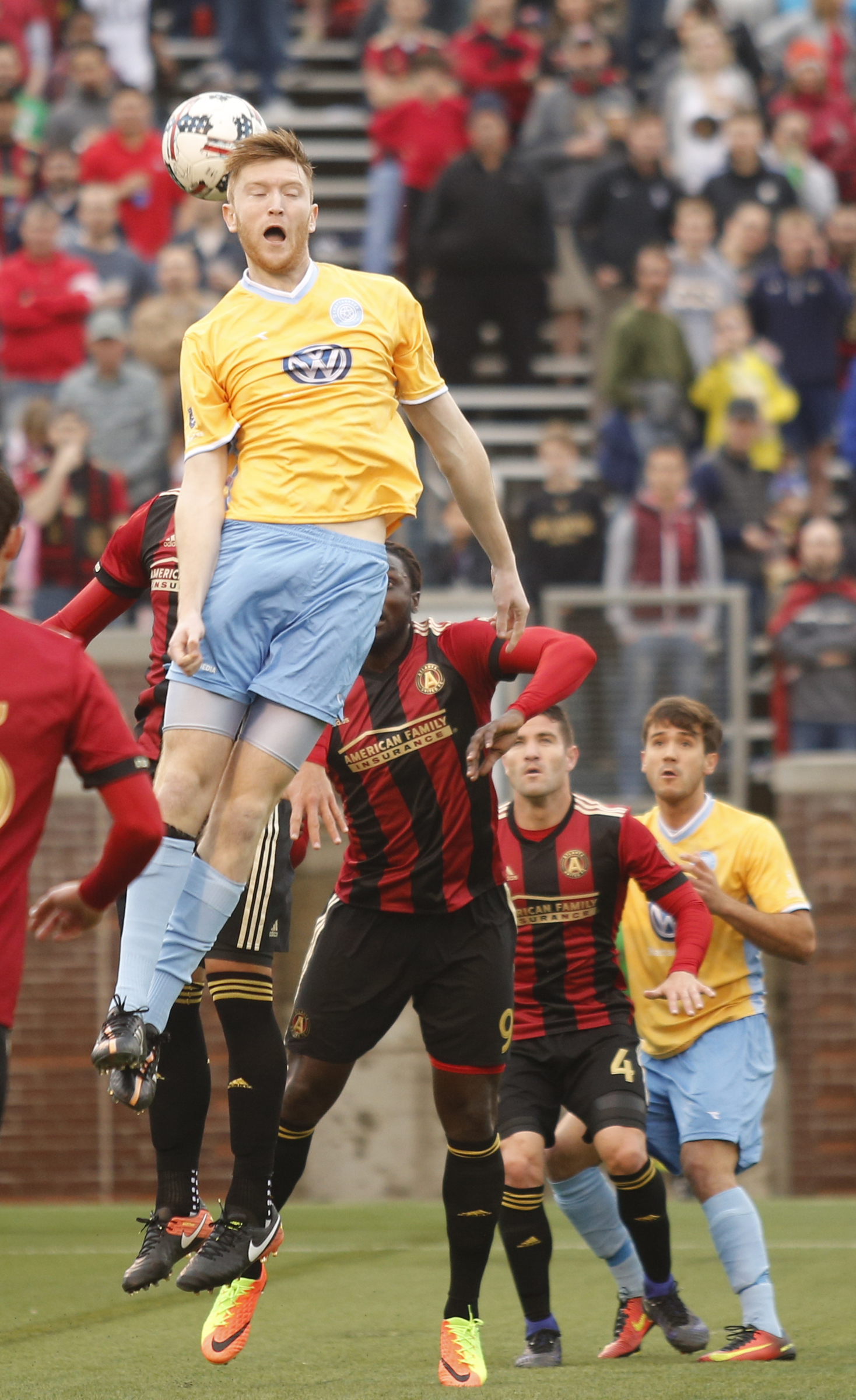 CFC's Danny Whitehall heads the ball over AUFC players during Chattanooga FC's friendly match against Atlanta United FC at Finely Stadium on Saturday, Feb. 11, 2017, in Chattanooga, Tenn.