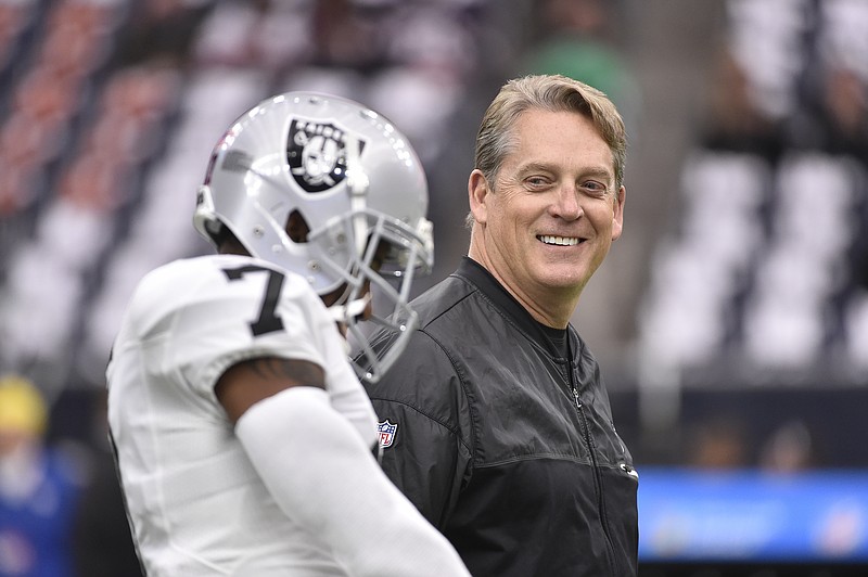 
              FILE - In this Saturday, Jan. 7, 2017, file photo, Oakland Raiders coach Jack Del Rio walks on the field before the first half of an AFC wild card NFL football game between the Houston Texans and the Raiders in Houston. The Raiders rewarded Del Rio with a new four-year contract Friday, Feb. 10, 2017, replacing the original four-year deal he received when he took the job in January 2015. (AP Photo/Eric Christian Smith, File)
            