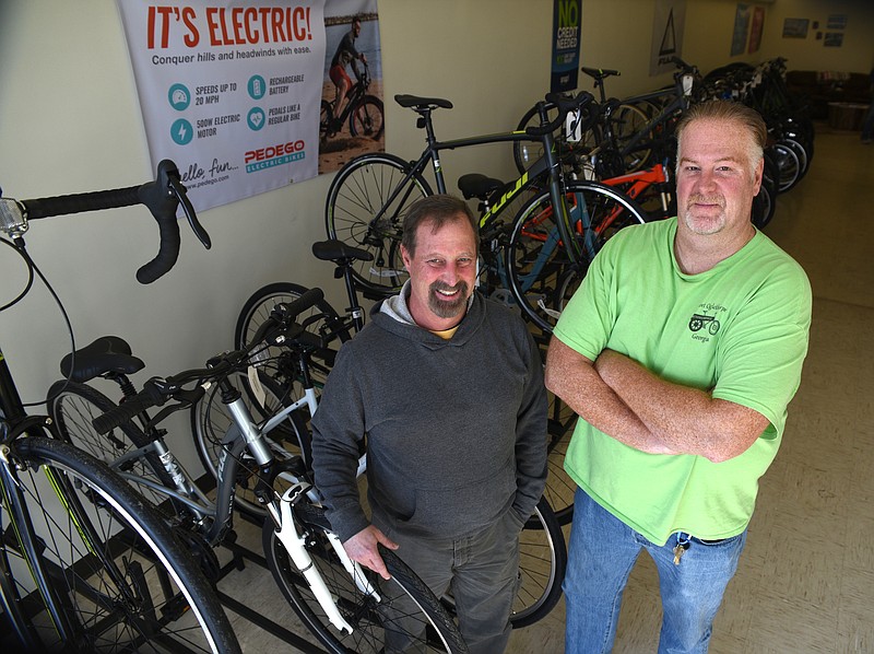 Cousins Patrick and David Bridges stand Thursday, Feb. 9, 2017 inside of Battlefield Bikes in Fort Oglethorpe, Ga.