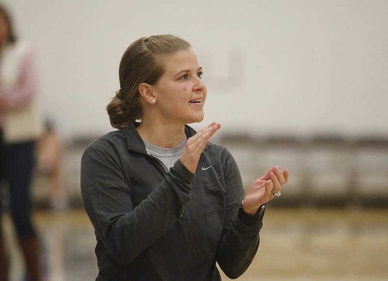 Red Bank girls' basketball coach Bailey McGinnis, shown encouraging her team during the preseason city jamboree, guided her Lady Lions to the regular-season title in competitive District 6-AA.