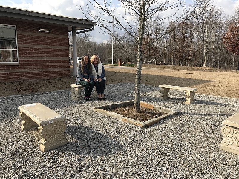 Nolan Elementary art teacher Kathie Nolan, left, and third-grade teacher Becky Leary sit in the courtyard where a medieval labyrinth is being constructed. The labyrinth will be dedicated to Nolan's mother-in-law, Anne Nolan, former Signal Mountain mayor and the school's namesake, who passed away in December.