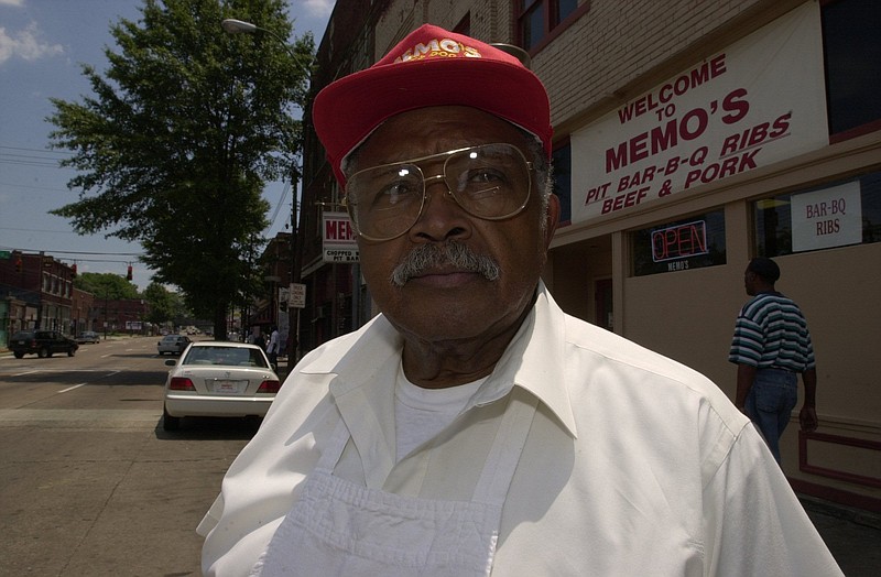 The late Richard Williams Jr., who purchased Memo's Grill in 1966, stands in front of his former business on M.L. King Boulevard. The restaurant, now owned by his children, is celebrating its 50th anniversary Feb. 23-25.