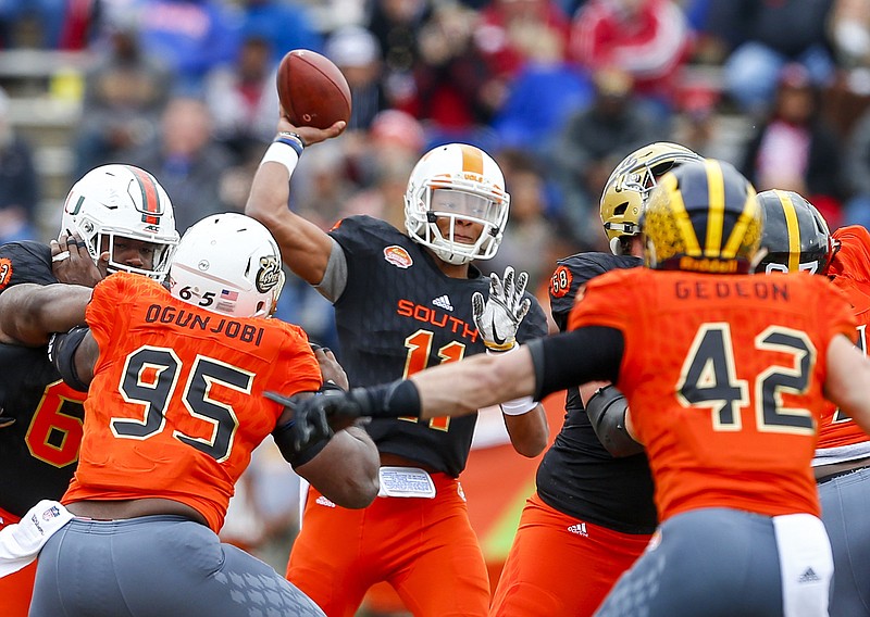 South squad quarterback Josh Dobbs of Tennessee (11) throws a pass against the North squad during the first half of the Senior Bowl NCAA college football game, Saturday, Jan. 28, 2017, at Ladd-Peebles Stadium in Mobile, Ala. (AP Photo/Butch Dill)