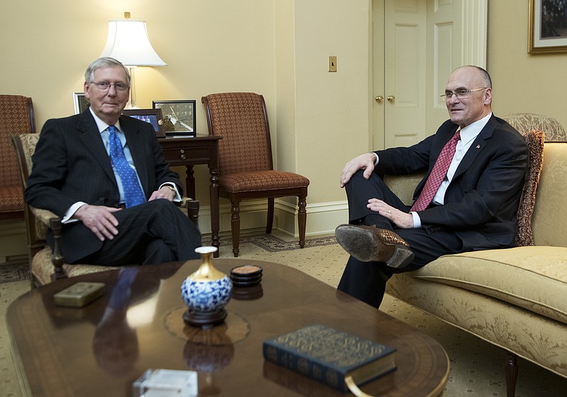 
              FILE - In this Jan. 5, 2017 file photo, Senate Majority Leader Mitch McConnell meets Labor Secretary-designate Andy Puzder in his office on Capitol Hill in Washington. Supporters of Puzder are launching a campaign to defend him after months of criticism from Democrats and labor groups.  (AP Photo/Manuel Balce Ceneta, File)
            