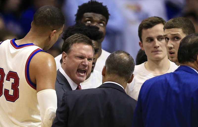 
              Kansas head coach Bill Self yells at his team during a timeout in the first half of an NCAA college basketball game against West Virginia in Lawrence, Kan., Monday, Feb. 13, 2017. (AP Photo/Orlin Wagner)
            