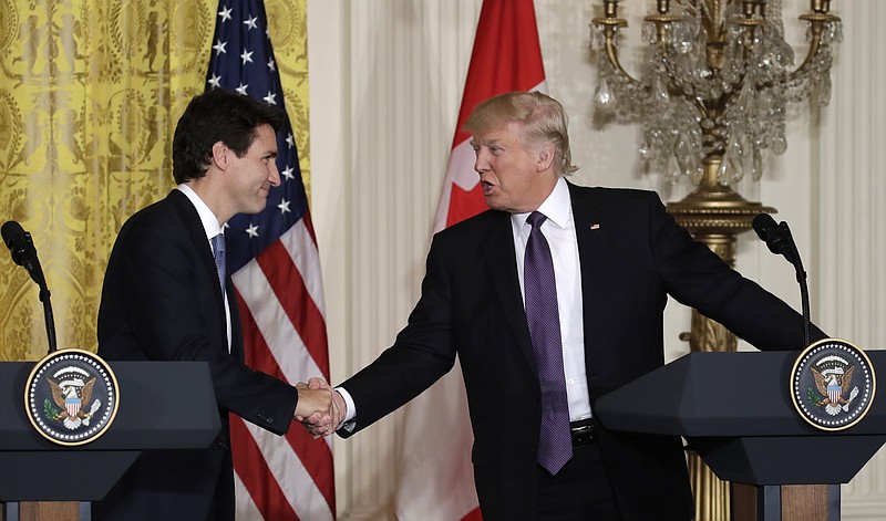 President Donald Trump and Canadian Prime Minister Justin Trudeau shakes hands during their joint news conference in the East Room of the White House, Monday, Feb. 13, 2017, in Washington. (AP Photo/Evan Vucci)