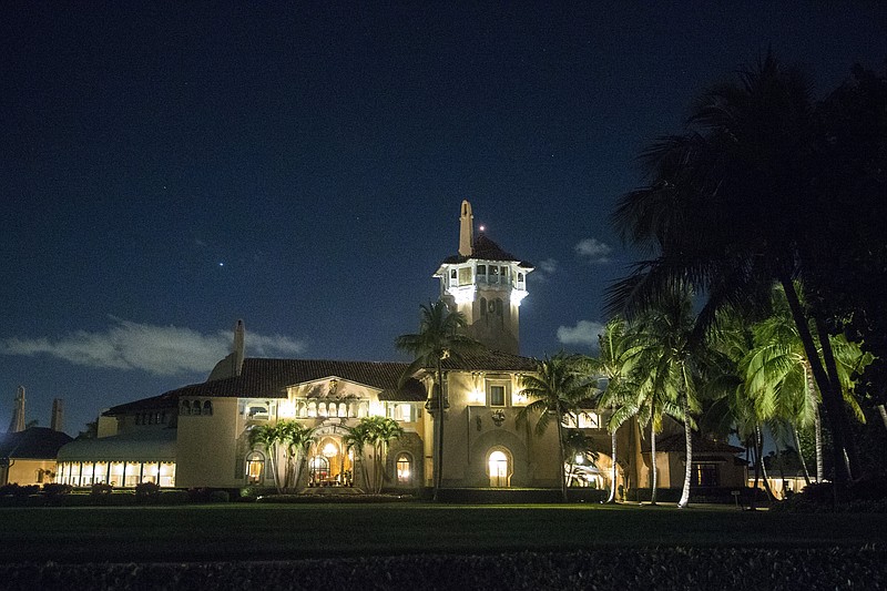 The Mar-a-Lago resort as President Donald Trump and Prime Minister Shinzo Abe of Japan have dinner on a patio overlooking the pool in Palm Beach, Fla., as they deal with information about a missile launched by North Korea toward the sea off its eastern coast. (Al Drago/The New York Times)