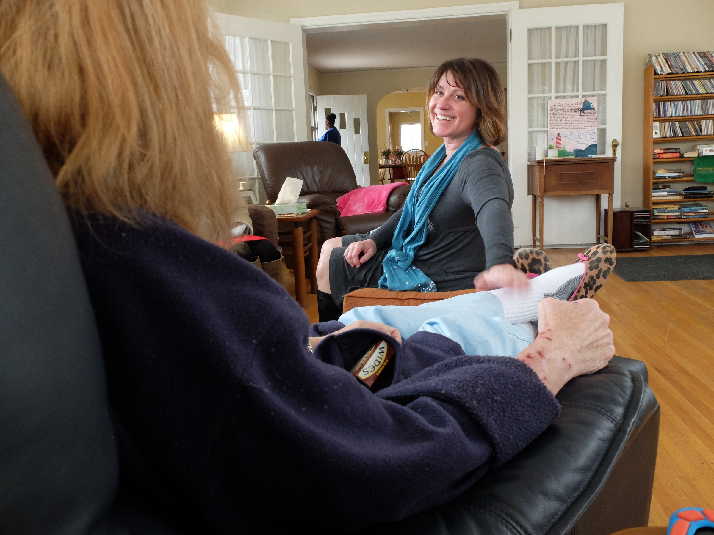 Welcome Home of Chattanooga executive director Sherry Campbell communicates with a resident Tuesday at the Germantown Road facility.