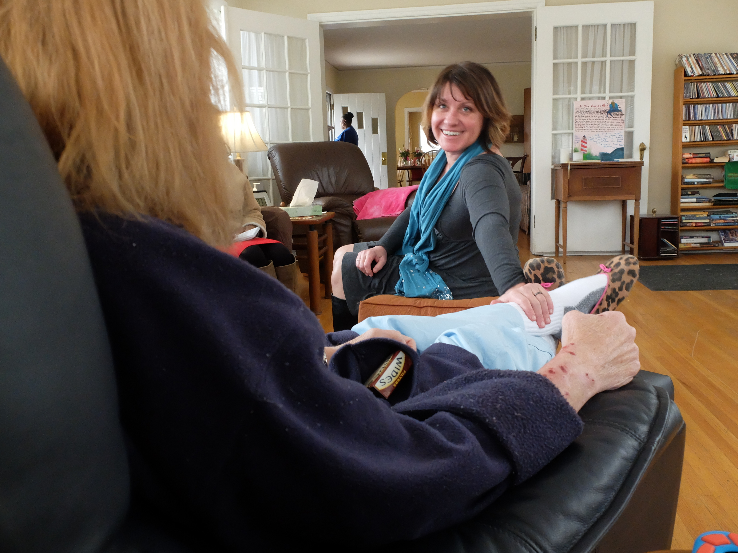 Welcome Home of Chattanooga executive director Sherry Campbell communicates with a resident Tuesday at the Germantown Road facility.