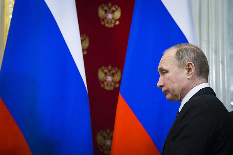 Russian President Vladimir Putin arrives to attend his and Slovenian President Borut Pahor news conference after their talks at the Kremlin in Moscow, Russia, Friday, Feb. 10, 2017. (AP Photo/Alexander Zemlianichenko, pool)