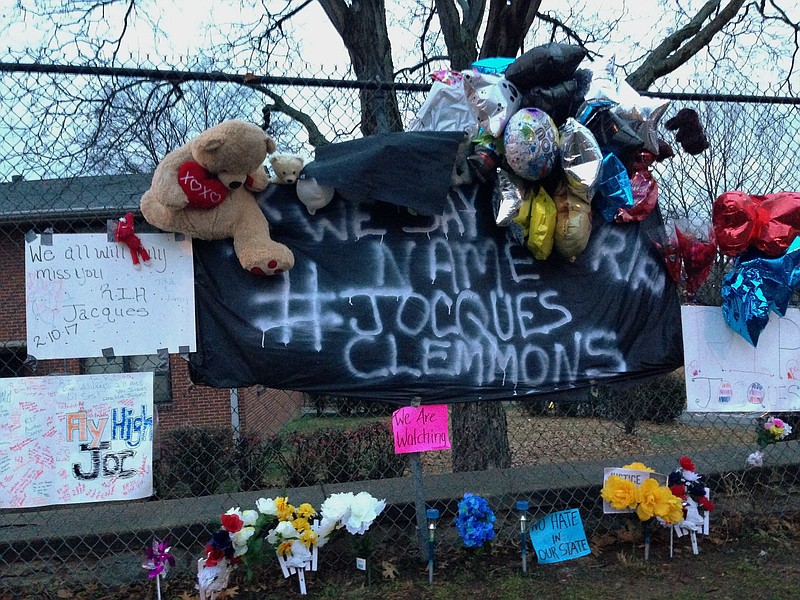 
              A memorial is seen set up in a neighborhood where near where Nashville Officer Josh Lippert on Friday shot Jocques Scott Clemmons in a Nashville, Tenn., Tuesday, Feb. 14, 2017. Clemmons died at the hospital Friday. Newly obtained surveillance video has caused Nashville police to revise their account of a traffic stop on Friday that ended with the white officer shooting and killing an armed African-American man. (AP Photo/Jonathan Mattise)
            