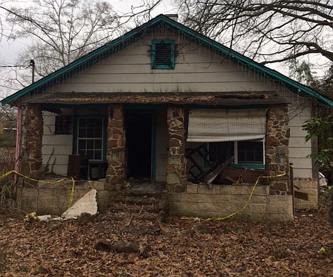 A house at 748 Highland Ave. in Summerville, Ga., caught fire Saturday night, destroying the inside and killing a man. Investigators believe the fire ignited when a candle tipped over.