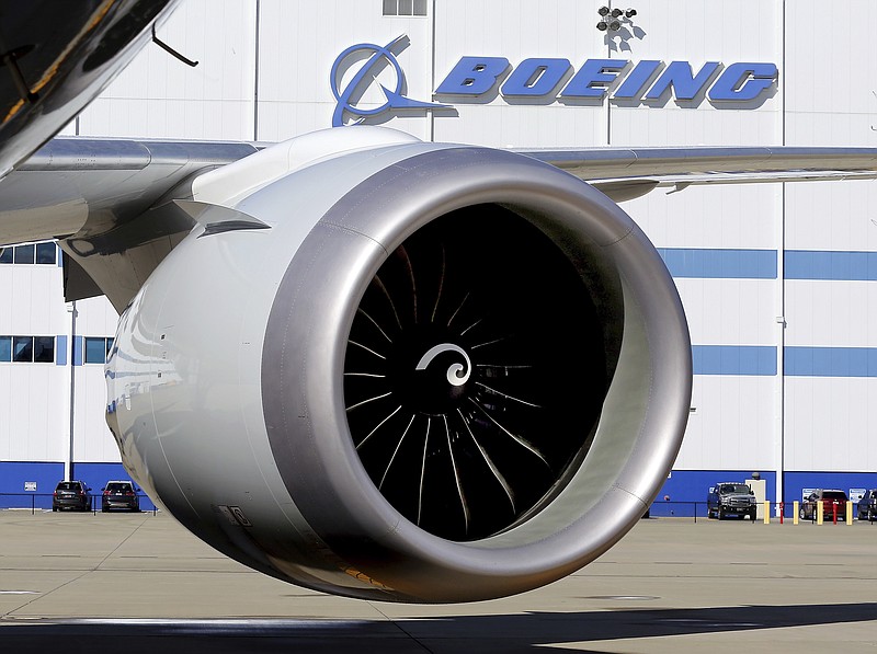 
              FILE - In this Tuesday, Feb. 16, 2016 file photo, An engine and part of a wing from the 100th 787 Dreamliner to be built at Boeing of South Carolina's North Charleston, S.C., facility are seen outside the plant. The morning round of voting has concluded Wednesday, Feb. 15, 2017, among South Carolina Boeing workers considering if they want representation by a union. Nearly 3,000 production workers are eligible to vote in the election to determine if they'll be represented by the International Association of Machinists and Aerospace Workers. (Brad Nettles/The Post and Courier via AP, File)
            