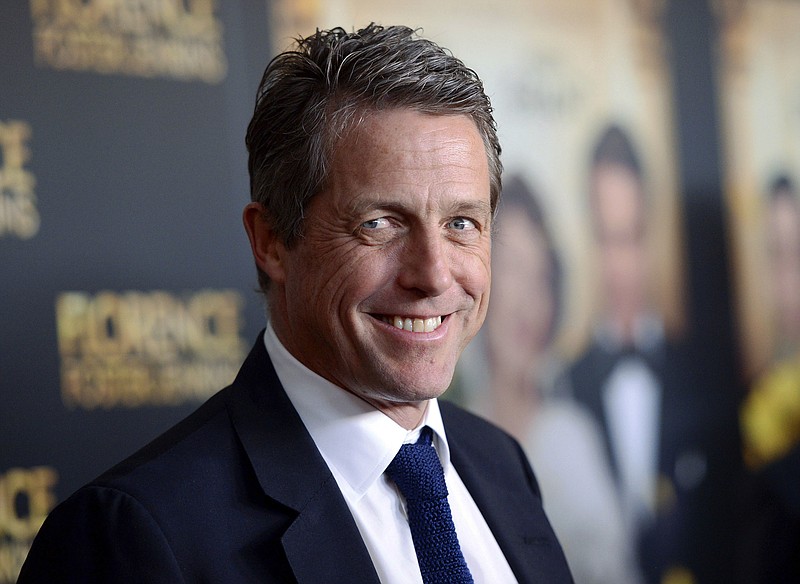 
              FILE - This Aug. 9, 2016 file photo shows actor Hugh Grant at the premiere of "Florence Foster Jenkins" in New York. Grant will be among several cast members from the 2003 film, "Love Actually," returning for a 10-minute reunion film airing as part of  Comic Relief’s “Red Nose Day Special” on NBC in May.  (Photo by Evan Agostini/Invision/AP, File)
            
