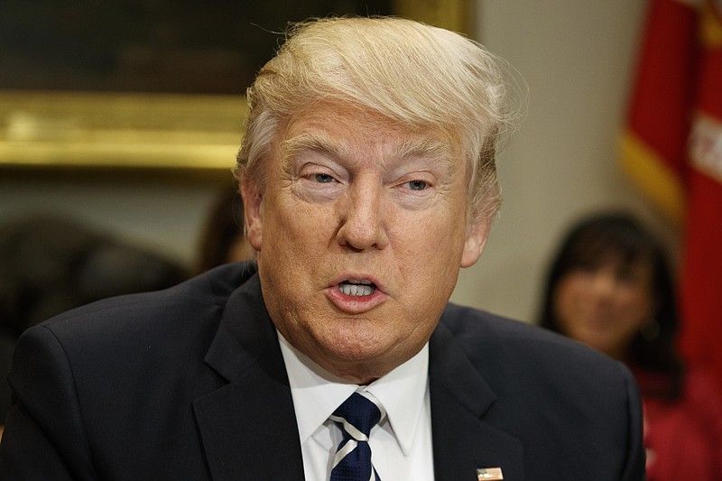 
              FILE - In this Feb. 14, 2017 file photo, President Donald Trump speaks during a meeting with parents and teachers, in the Roosevelt Room of the White House in Washington. (AP Photo/Evan Vucci, File)
            