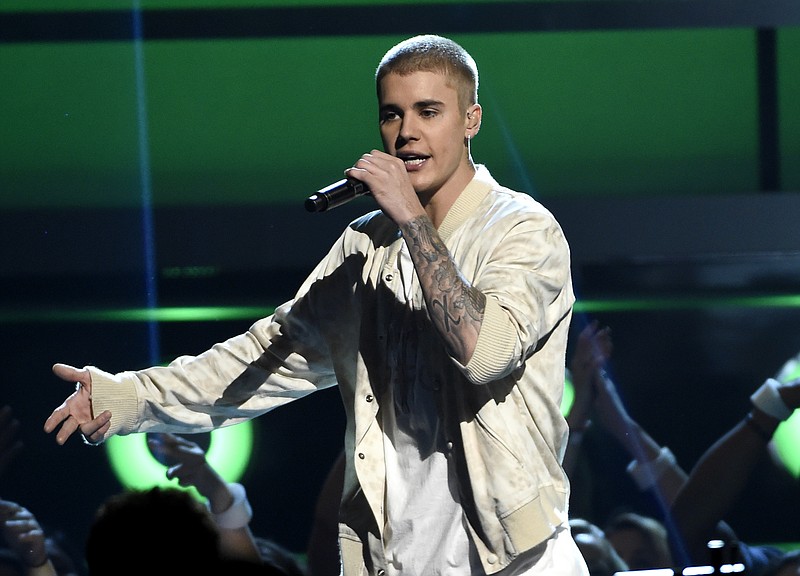 
              FILE - In this May 22, 2016 file photo, Justin Bieber performs at the Billboard Music Awards in Las Vegas. A Las Vegas man who says Bieber assaulted him in Cleveland eight months ago has filed a police report about the fracas. (Photo by Chris Pizzello/Invision/AP, File)
            