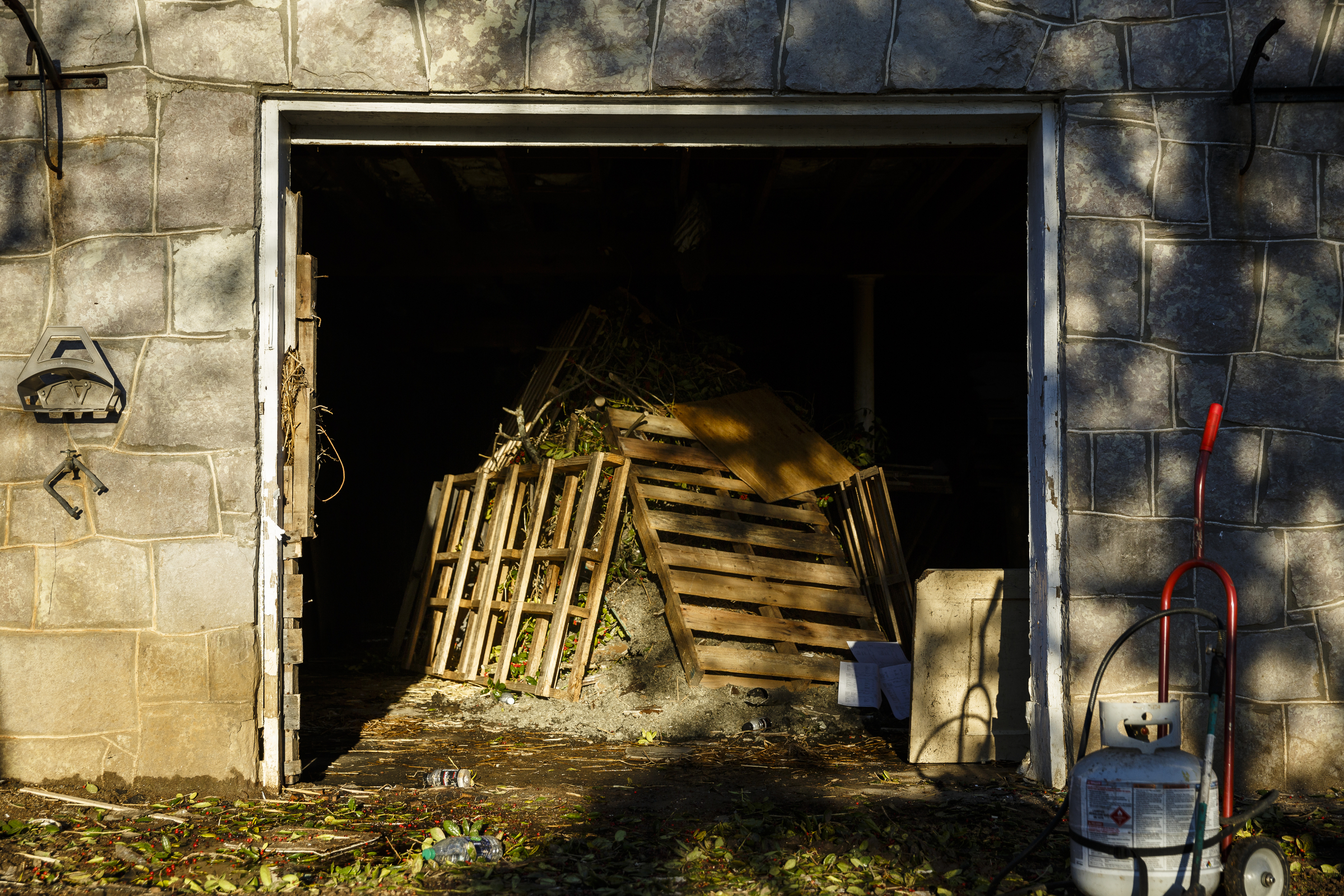 Kindling is piled in the basement of an empty structure at a live burn training event by the Chattanooga Fire Department on Robin Drive on Thursday, Feb. 16, 2017, in Chattanooga, Tenn. The fire department uses live burns as part of their fire academy training, culminating in the complete immolation of a structure.