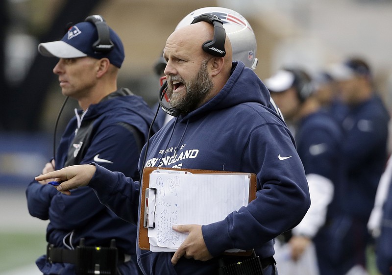 New England Patriots tight ends coach Brian Daboll, right, shouts instructions as he and defensive line coach Brendan Daly watch from the bench area during the second half of an NFL football game against the Buffalo Bills, Sunday, Oct. 2, 2016, in Foxborough, Mass. (AP Photo/Elise Amendola)