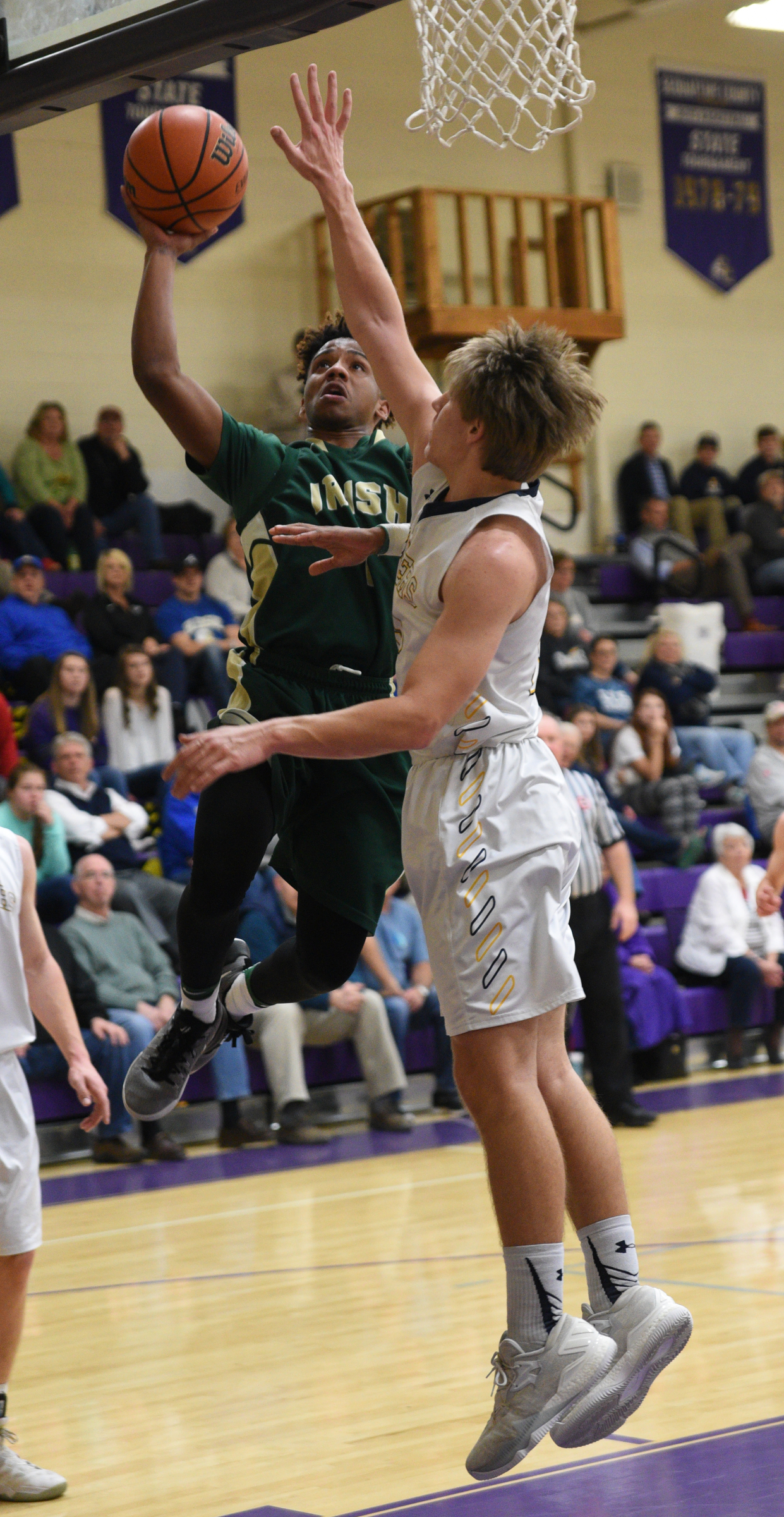 Notre Dame's Kolby McGowan is guarded by Chattanooga Christian's Ryan Rhodes Thursday, Feb. 16, 2017 at Sequatchie County High School.