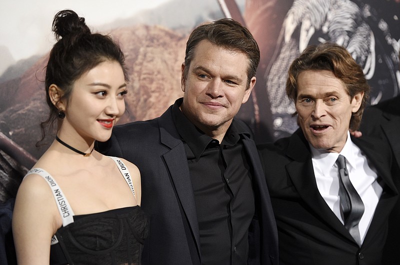 
              Jing Tian, from left, Matt Damon, and Willem Dafoe, cast members in "The Great Wall," pose together at the premiere of the film at the TCL Chinese Theatre on Wednesday, Feb. 15, 2017, in Los Angeles. (Photo by Chris Pizzello/Invision/AP)
            