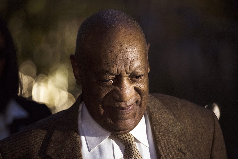FILE- In this Dec. 14, 2016, file photo, Bill Cosby departs after a pretrial hearing in his sexual assault case at the Montgomery County Courthouse in Norristown, Pa. A federal judge in Massachusetts on Thursday, Feb. 16, 2017, dismissed a defamation lawsuit against Cosby, although he still faces criminal charges in Pennsylvania. (AP Photo/Matt Rourke, File)