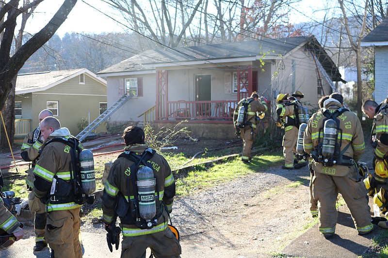 Firefighters rescued a woman from this home in the 4600 block of Highland Avenue during a fire Feb. 16
