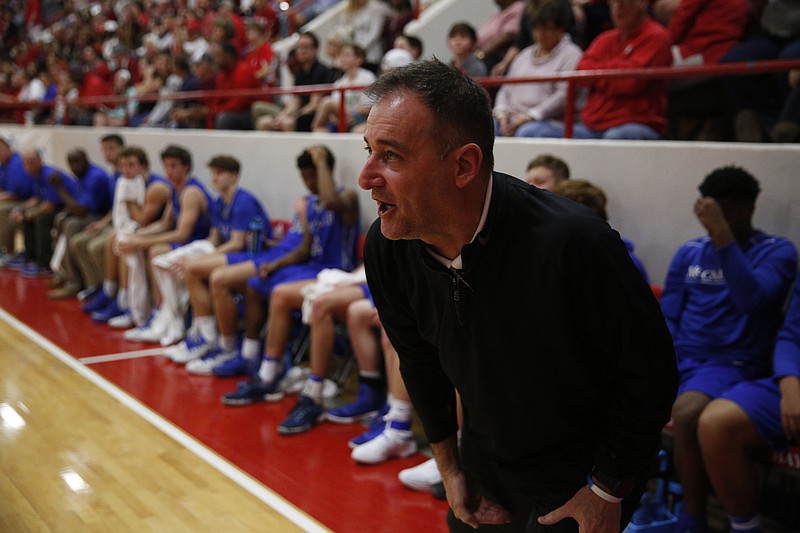 McCallie Coach John Shulman shouts to players during their prep basketball game at Baylor School on Friday, Feb. 17, 2017, in Chattanooga, Tenn. 