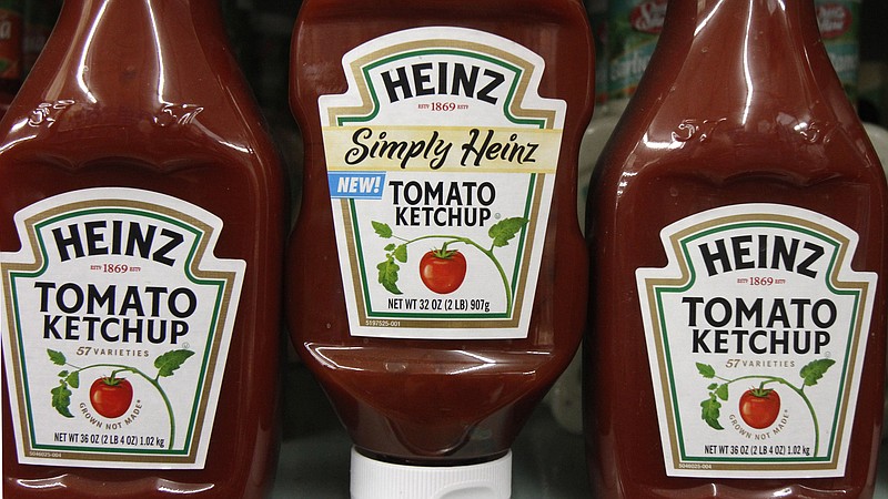 
              FILE- In this March 2, 2011, file photo, Heinz ketchup bottles are displayed on the shelf of a market on in Barre, Vt. U.S. food giant Kraft Heinz Co. says its offer to buy Europe’s Unilever was rejected, but that it is still pursuing the deal. The maker of Oscar Mayer meats, Jell-O pudding and Velveeta cheese said there’s no certainty that it will make another offer for Unilever, which owns brands including Hellmann’s, Lipton and Knorr.  (AP Photo/Toby Talbot, File)
            
