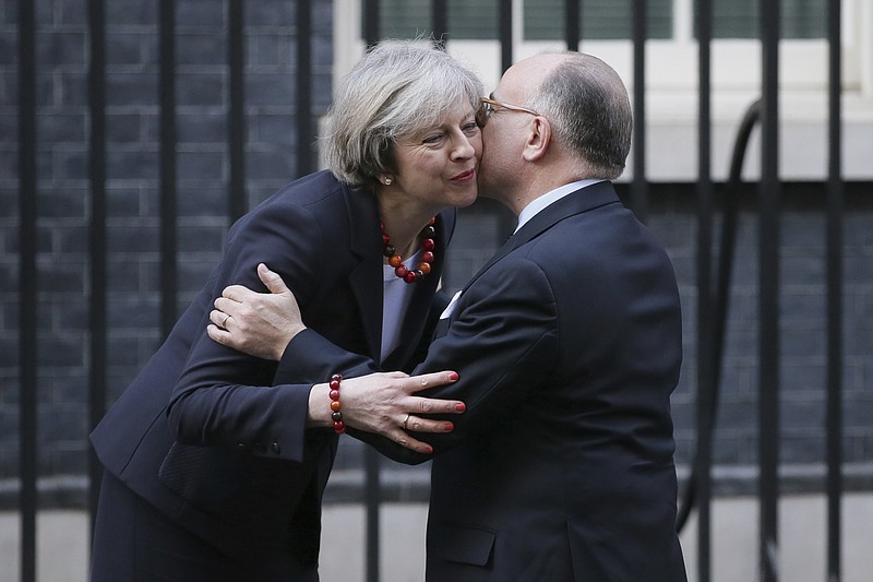 
              Britain's Prime Minister Theresa May greets French Prime Minister Bernard Cazeneuve at 10 Downing Street in London, Friday Feb. 17, 2017.  Cazeneuve is in London for bilateral discussions.(AP Photo/Tim Ireland)
            