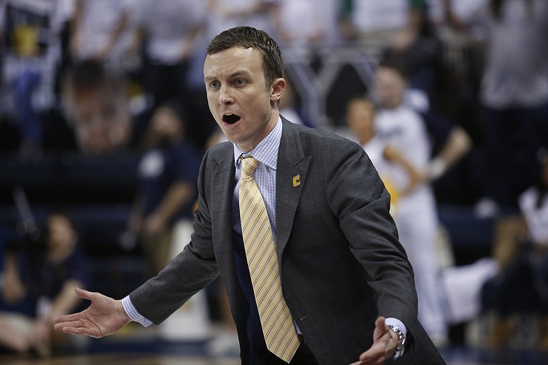 UTC basketball coach Matt McCall questions a call during the Mocs' basketball game against the ETSU Buccaneers at McKenzie Arena on Saturday, Feb. 18, 2017, in Chattanooga, Tenn. UTC fell to 10-5 in the SoCon following their 65-51 loss to ETSU.