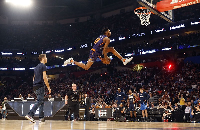 
              Indian Pacers Glenn Robinson III participates in the slam dunk contest during NBA All-Star Saturday Night events in New Orleans, Saturday, Feb. 18, 2017. (AP Photo/Gerald Herbert)
            