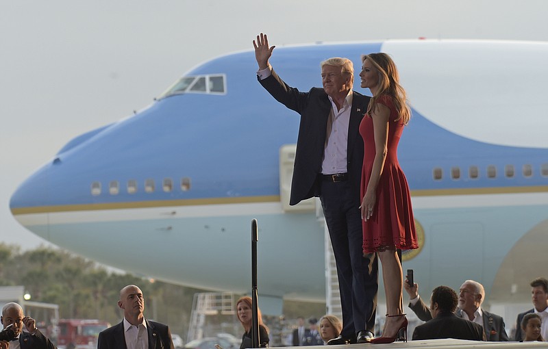 President Donald Trump and first lady Melania Trump arrive for the "Make America Great Again Rally" at Orlando-Melbourne International Airport in Melbourne, Fla., Saturday, Feb. 18, 2017. (AP Photo/Susan Walsh)

