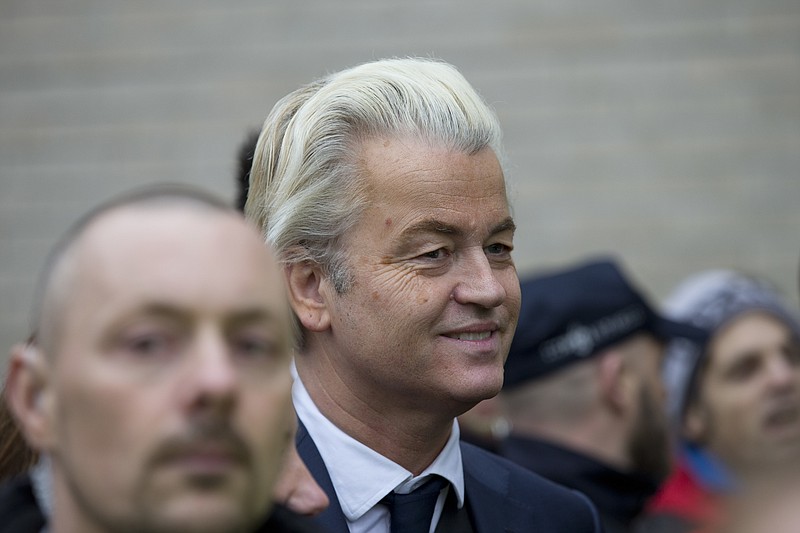 
              Firebrand int-islam lawmaker Geert Wilders smiles during an election campaign stop in Spijkenisse, near Rotterdam, Netherlands Saturday Feb. 18, 2017. Now, as a March 15 parliamentary election looms, the political mood is turning inward as Wilders dominates polls with an isolationist manifesto that calls for the Netherlands "to be independent again. So out of the EU." (AP Photo/Peter Dejong)
            