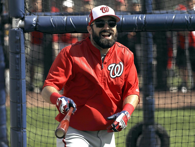 
              Washington Nationals center fielder Adam Eaton laughs while taking batting practice during a spring training baseball workout Sunday, Feb. 19, 2017, in West Palm Beach, Fla. Eaton, who is expected to start in center field and bat first or second in the lineup, began showing the Nationals what he can do during Sunday's first official full-squad workout of spring training. (AP Photo/David J. Phillip)
            